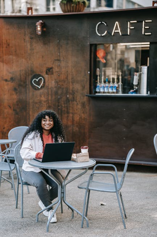 A woman eating outdoors A woman eating outdoors