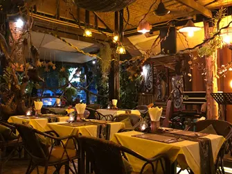 A restaurant with flowery decorations