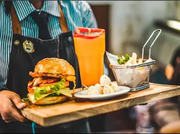 Waiter Serving Food