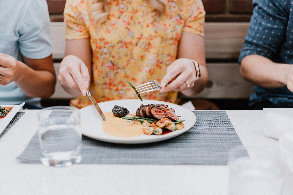 Women eating a fancy dinner