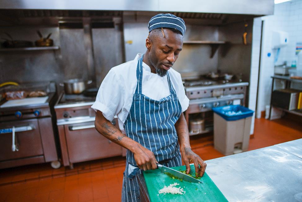 A chef chopping food